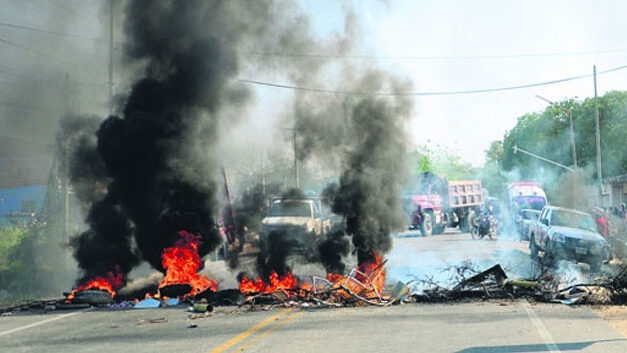 Failing public utilities spur riots in northern Colombia; 1 dead, at least 6 injured