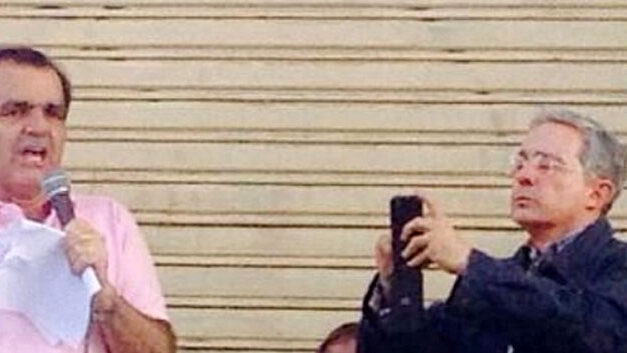 Zuluaga and Uribe under fire after admitting wiretap suspect worked for campaign