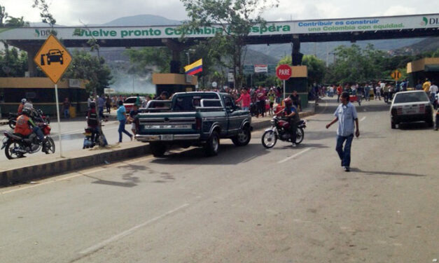 Shots and explosions heard at Venezuela-Colombia border amid protest